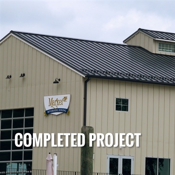 Pre-assembled clamps for metal roof snow guards safeguard walkways from snow hazards.