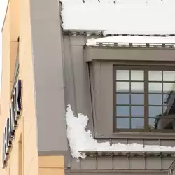 Delmar Hotel in West Hartford CT protected by AceClamp's fast-installing metal roof snow bars.