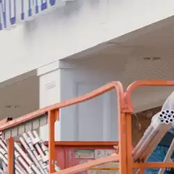 Ian Howard from Advanced Welding installing AceClamp Snow Rail System.