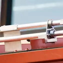 Close-up of pre-assembled AceClamp metal roof ice guards