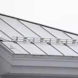 Patented push-pin design clamp has no set screws, preserving the roofing panel and warranty.