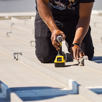 AceClamp metal roof clamps installed on standing seam roof