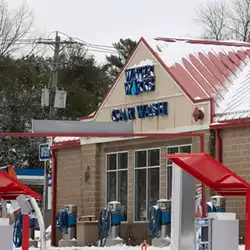 2-bar snow retention for metal roofing at Water Works Car Wash