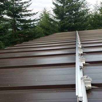 Color Snap snow rails for metal roofs